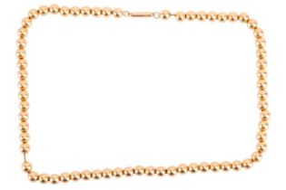 A ball link necklace, each bead with a satin finish and measuring approximately 5.9 mm, on a