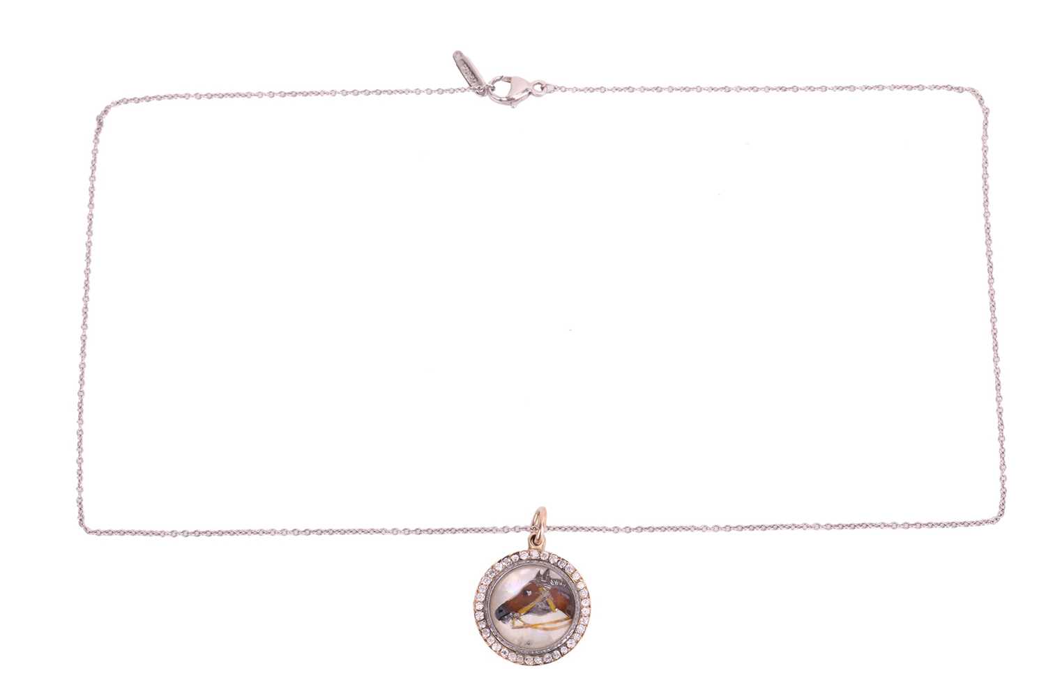 An Essex crystal horsehead pendant on a platinum chain, the round domed crystal with painted reverse - Image 3 of 4