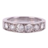 A diamond-set half-eternity ring in 18ct white gold, bead-set with six graduated brilliant-cut diamo