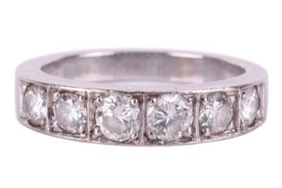 A diamond-set half-eternity ring in 18ct white gold, bead-set with six graduated brilliant-cut
