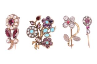 A collection of four early 19th century gem-set brooches; comprising a floral spray brooch set