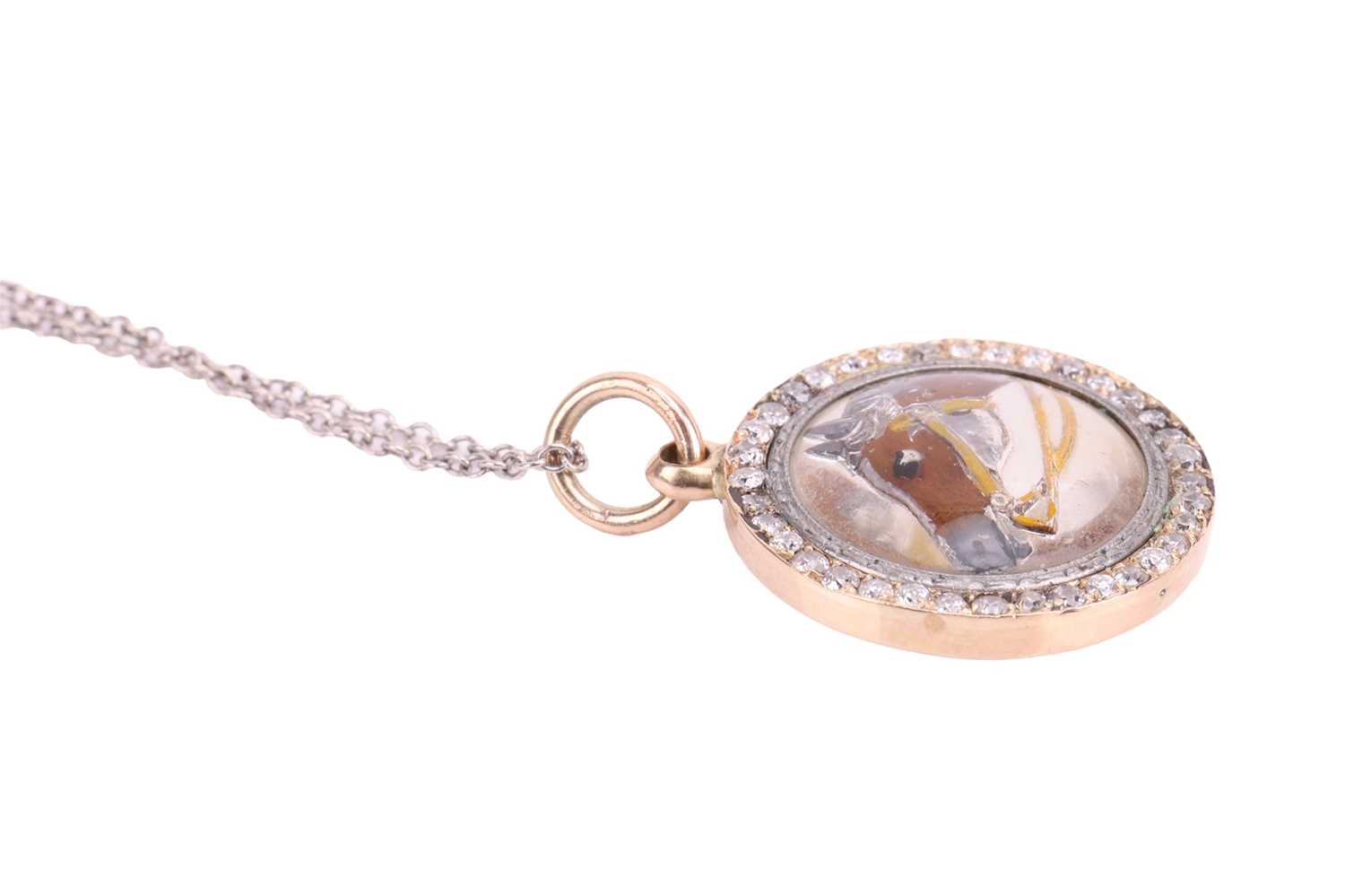 An Essex crystal horsehead pendant on a platinum chain, the round domed crystal with painted reverse - Image 2 of 4