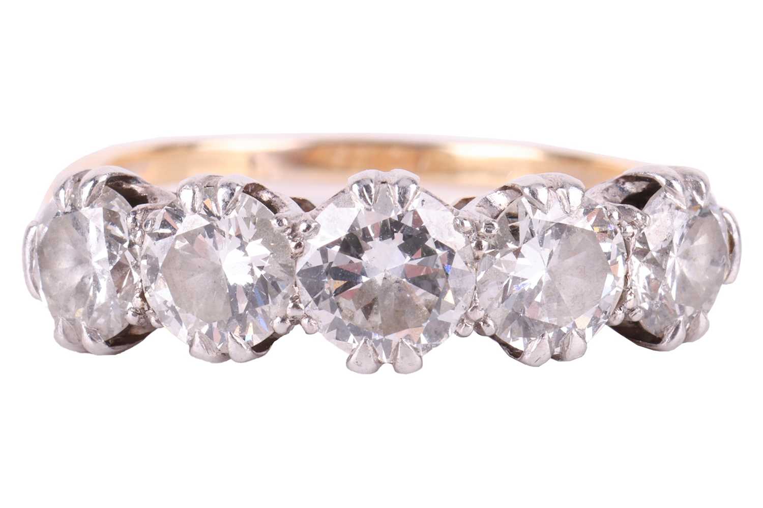 A diamond five-stone ring, featuring a row of round brilliant cut diamonds with a total estimated we