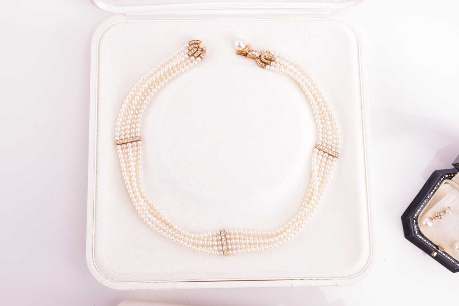 A cultured pearl necklace, bracelet and earrings suite; the necklace strung with five strands of 3mm - Image 3 of 4