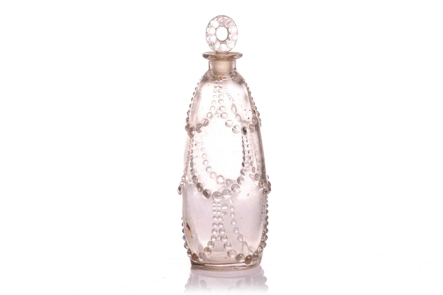 A René Lalique 'Palerme' clear glass scent bottle and stopper, No. 518, designed c.1926, with ribbon