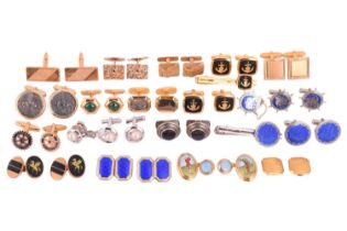 A collection of eighteen pairs of various cufflinks, including a pair of yellow metal rectangular mo