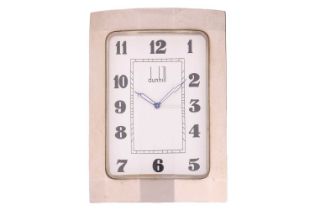 A Dunhill stainless steel quartz travel clock Model: 06.03581 Case Material: stainless steel Case