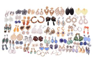 A collection of over sixty costume jewellery earrings and earclips, including a pair of gold plated 