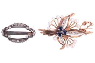 A sapphire, pearl and diamond spray brooch with an old-cut diamond slider. The spray brooch is