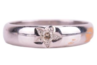 A diamond-set ring, star-set with a brilliant-cut diamond of 2.9 x 2.9 x 2.0 mm, approximately weigh