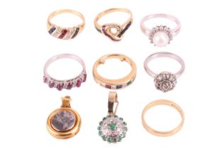 A collection of gem-set rings and pendants; including a flat wedding band with bark-effect in 18ct