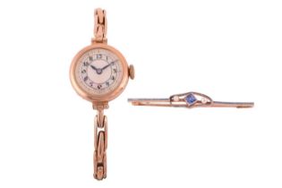 A late 1930s 9ct gold ladies wristwatch, with a mechanical 5-jewel movement, the cream face with