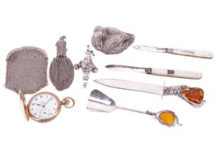 A collection of items including a matching knife and spoon stamped '925', the handles set with amber