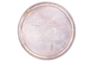 A George V silver salver, London 1935 by William Comyns &amp; Sons Ltd, of plain circular form with 