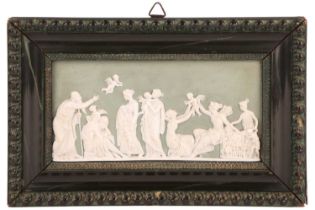 In the manner of Wedgwood, a 19th century framed bisque cameo wall plaque of an allegorical Greek sc