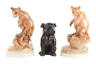 A pair of Zsolnay porcelain figures of bears in combat, together with a ceramic figure of a bulldogN