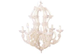 A Mid Century cut glass chandelier, with six scrolled arms decorated with a glass floral and bead de