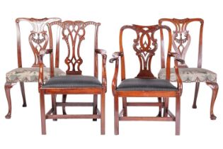 A pair of eighteenth-century Chippendale period mahogany cabriole legged side chairs with concave cr