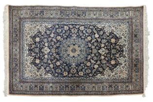 A navy ground Nain rug with a "Bookcover" design within a tiled border, 213 cm long x 126 cm wide