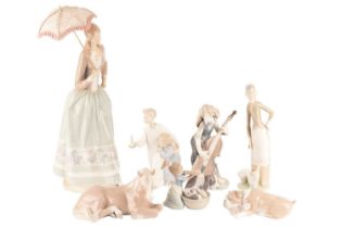 Collection of Lladro figurines to include the Lady with umbrella, a horse lying down, unlikely frien