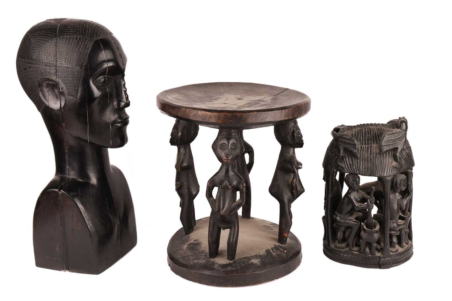 An African-carved wooden stool with figural supports on a circular base, alongside a large blackwood - Image 2 of 3