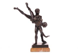A late 19th century Grand Tour bronze, depicting a pair of nude male wrestlers, plinth inscribed Lut