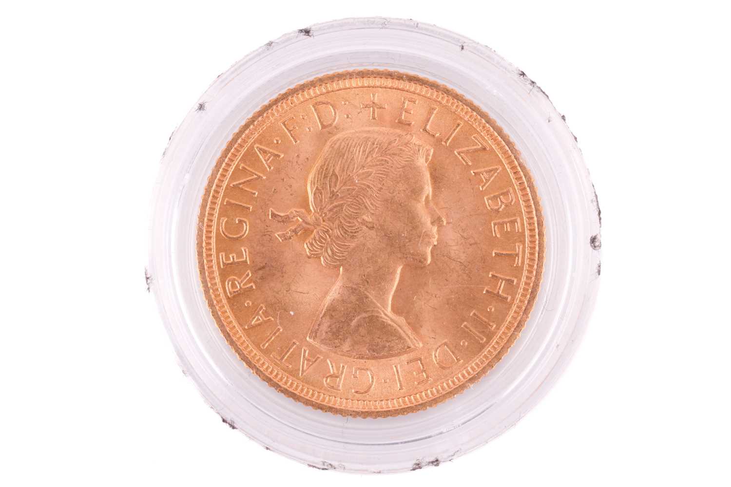 A 1958 Elizabeth II Full-Sovereign with a plastic case, circulated. - Image 2 of 2