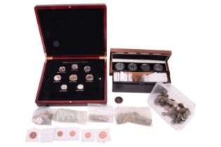 A large coin collection; including a reproduction George III half guinea token and two