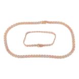 A 9ct tri-colour gold necklace and matching bracelet, featuring textured brick-style links; the brac