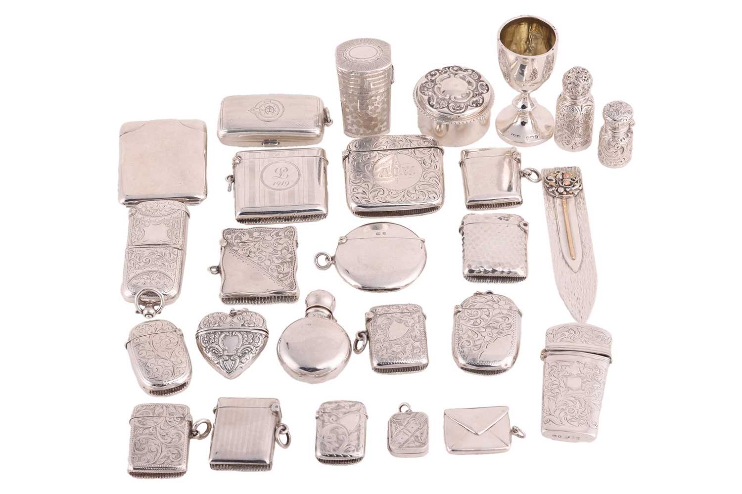 A collection of silver accoutrements; comprising, a double-ended sovereign cum vesta, a double sover