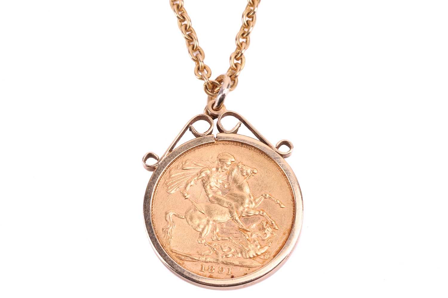 An 1891 Victoria full sovereign in a 9ct gold coin mount all on a yellow metal chain stamped 9ct. To