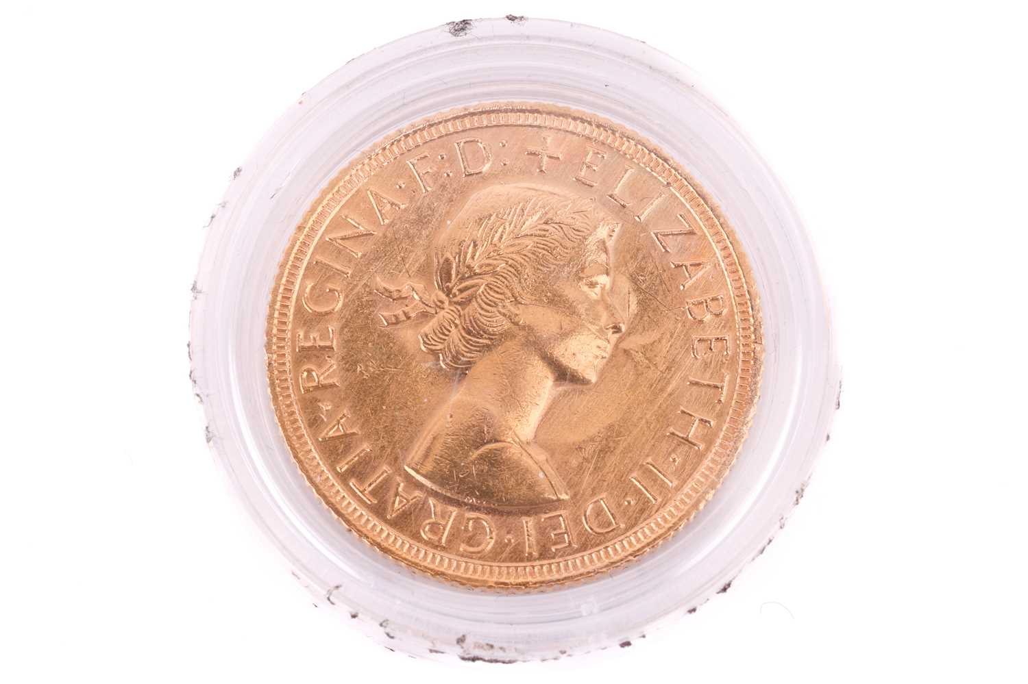 A 1958 Elizabeth II Full-Sovereign with a plastic case, circulated. - Image 2 of 2