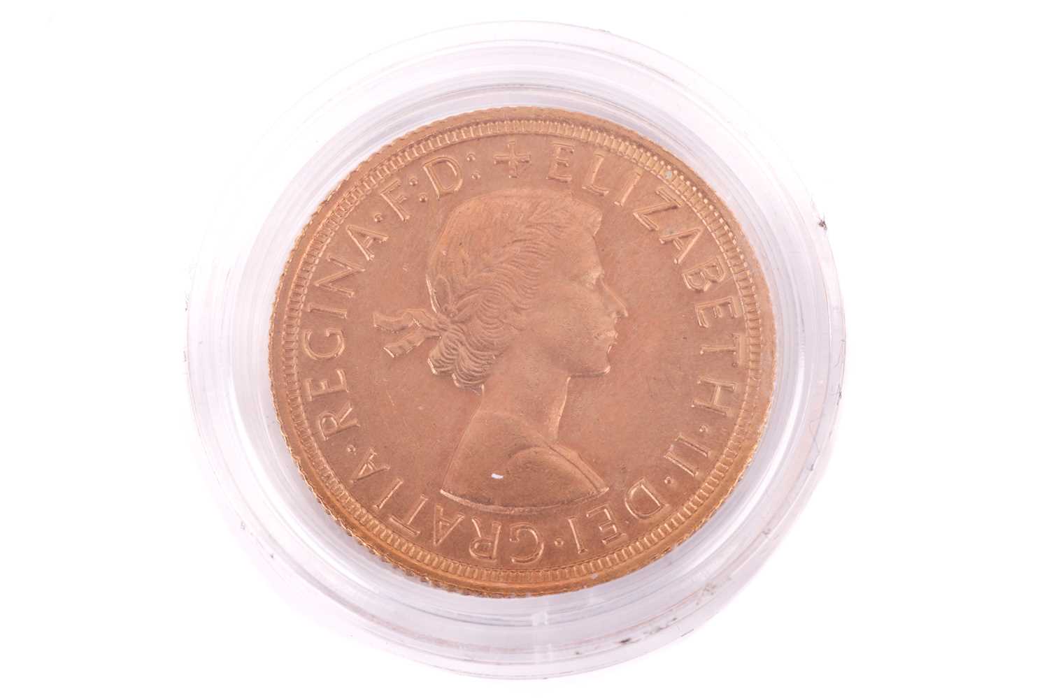 A 1964 Elizabeth II Full-Sovereign with a plastic case, circulated. - Image 2 of 2