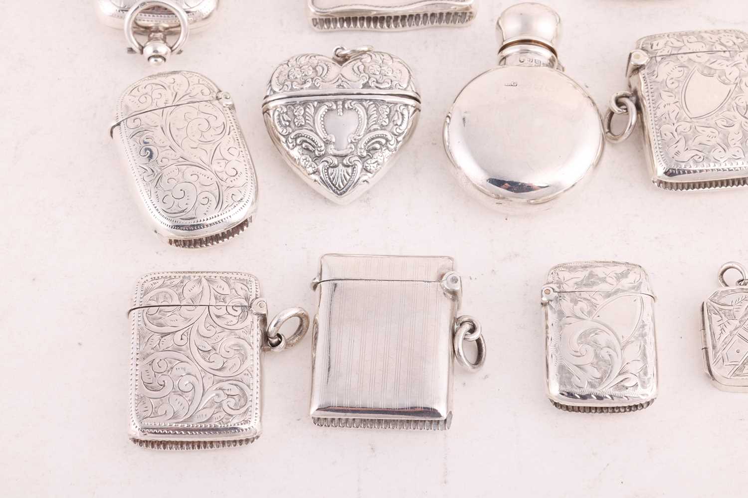 A collection of silver accoutrements; comprising, a double-ended sovereign cum vesta, a double sover - Image 7 of 14