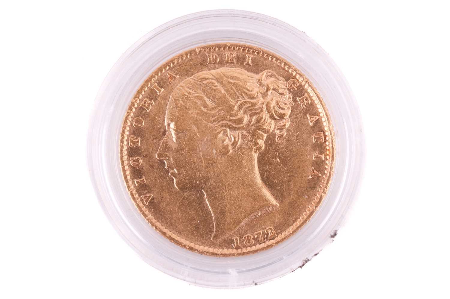 An 1872 Victoria 'Large head' Full-Sovereign shield back with a plastic case, circulated. - Image 2 of 2