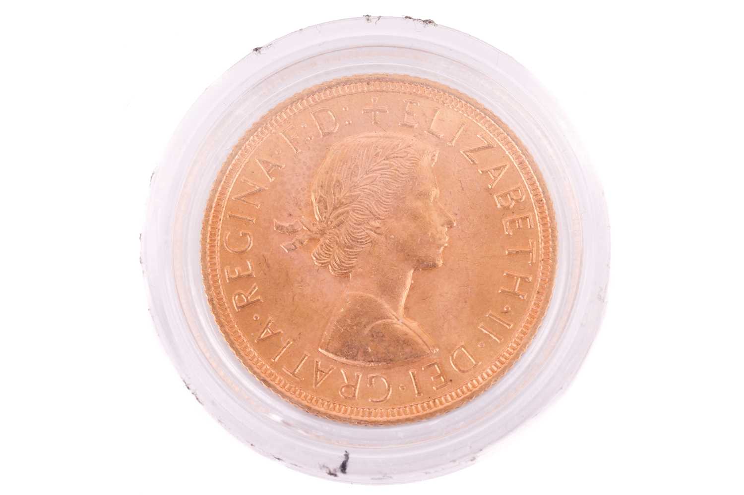 A 1958 Elizabeth II Full-Sovereign with a plastic case, circulated. - Image 2 of 2