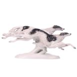 A Rosenthal porcelain figure of two Borzoi Wolfhounds racing, on an oval base, 61cm longWould benefi
