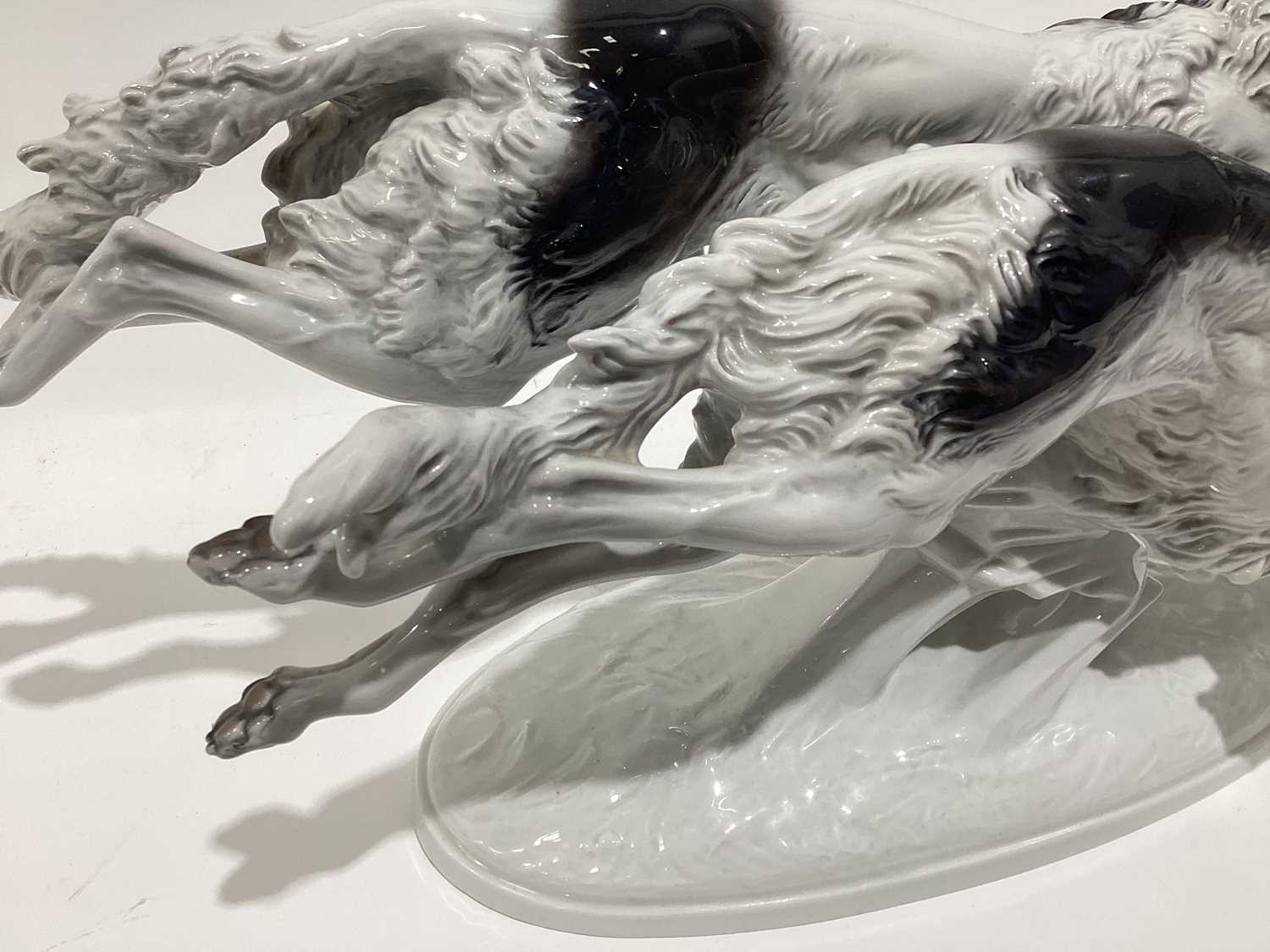 A Rosenthal porcelain figure of two Borzoi Wolfhounds racing, on an oval base, 61cm longWould benefi - Image 12 of 17