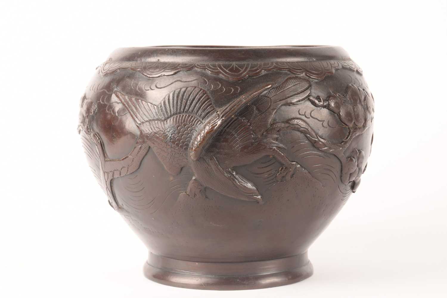 Saikyo Yoshida, A Japanese patinated bronze jardiniere of heavy baluster form, with sea eagles, finc