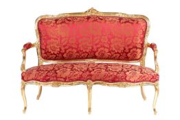 A 20th century Louis XV-style canape settee, with carved and molded wood and gilt gesso outline, stu