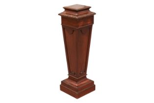 An Edwardian mahogany square section pedestal of Neo-Classical form with decorative carved and mould