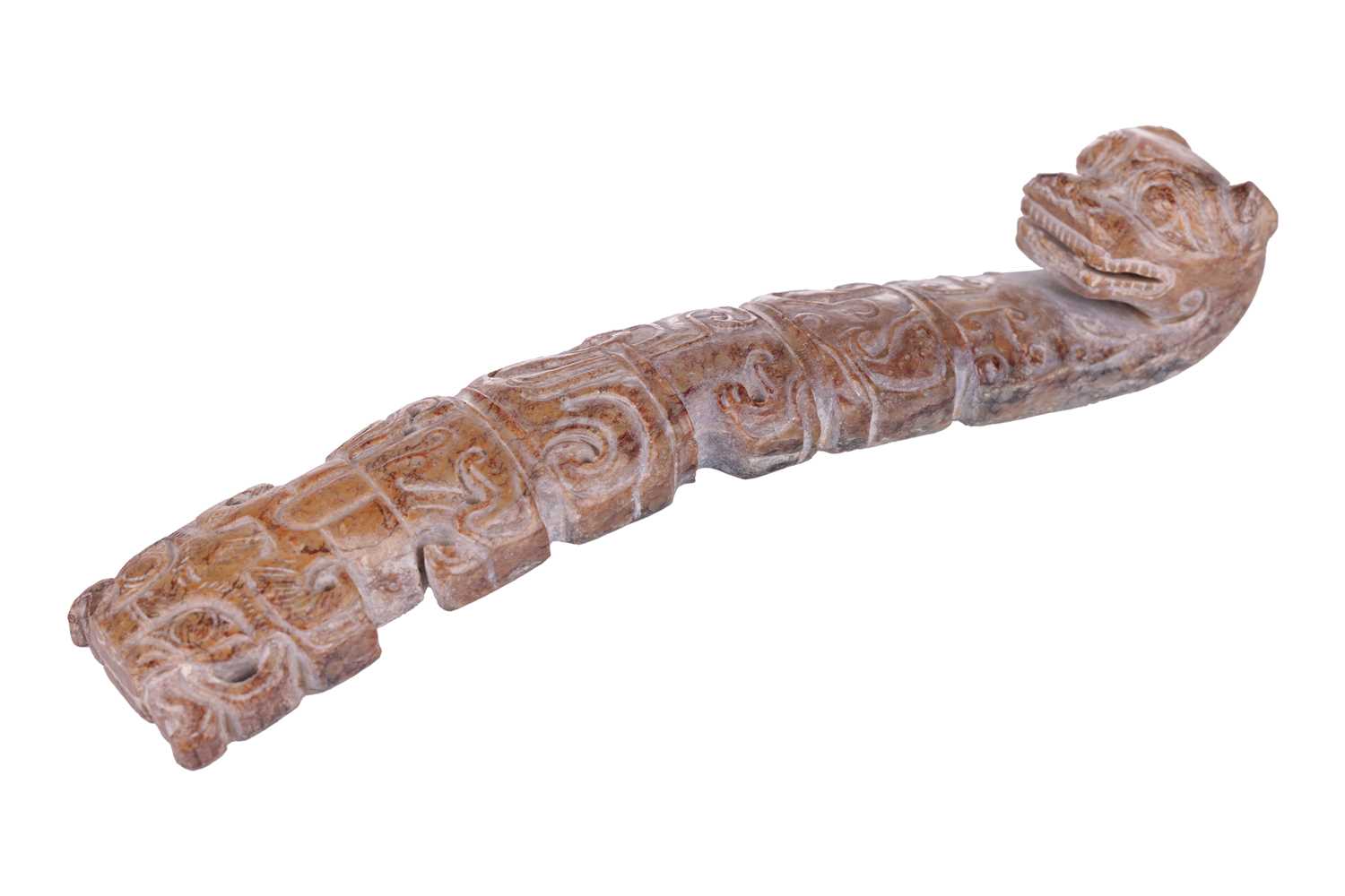 A large Chinese archaistic carved buff jade belt hook, considered to be pre-Tang Dynasty (see receip