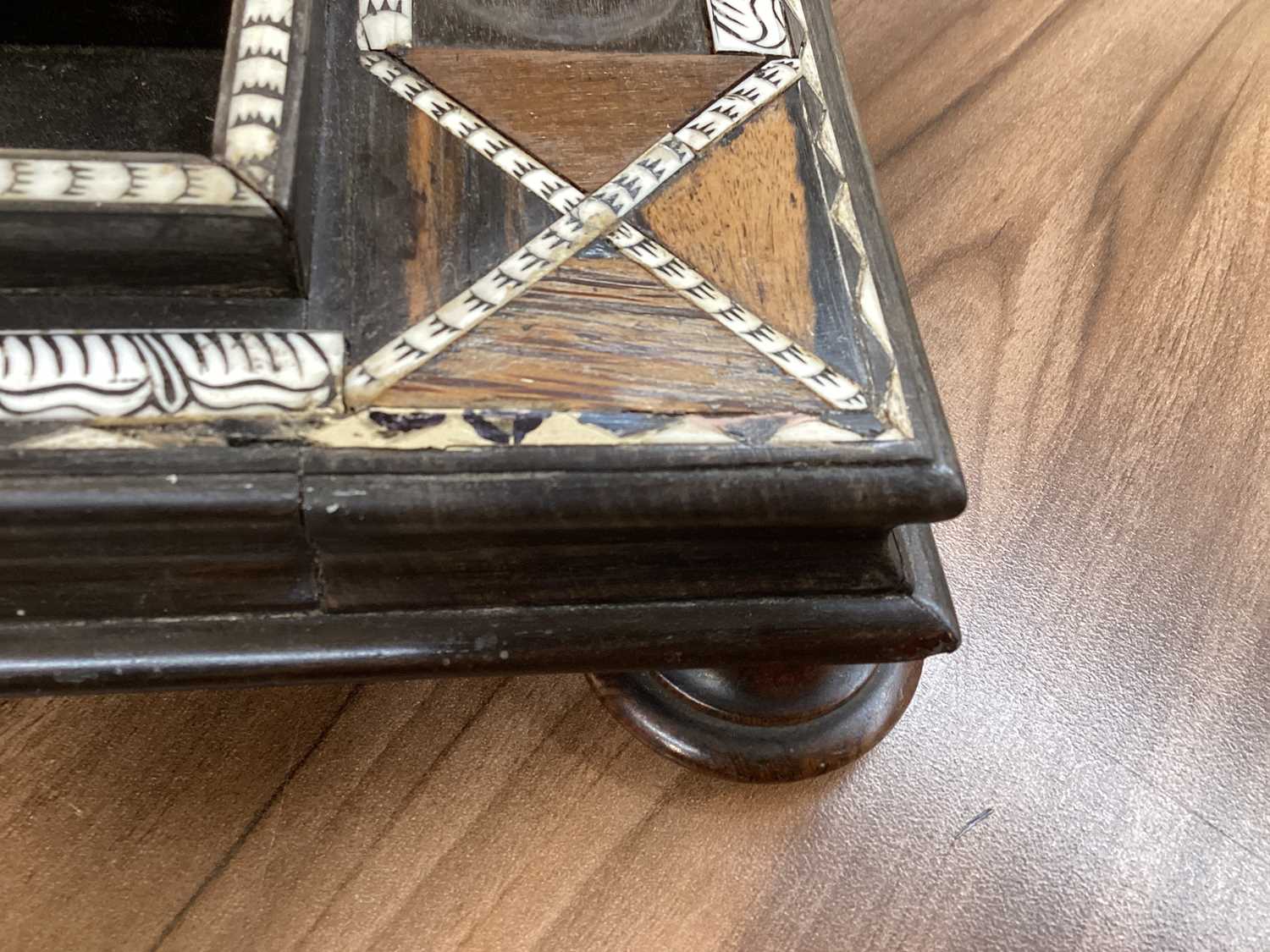 A Ceylonese ebony desk stand with calamander, coconut palm, and rosewood parquetry within pen-worked - Image 7 of 17