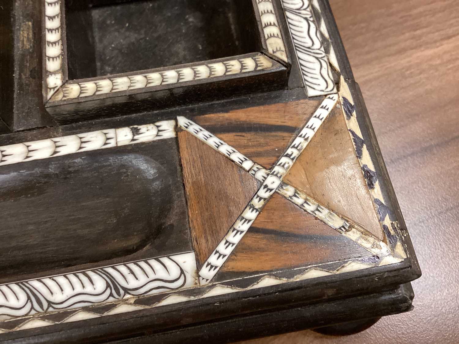 A Ceylonese ebony desk stand with calamander, coconut palm, and rosewood parquetry within pen-worked - Image 9 of 17