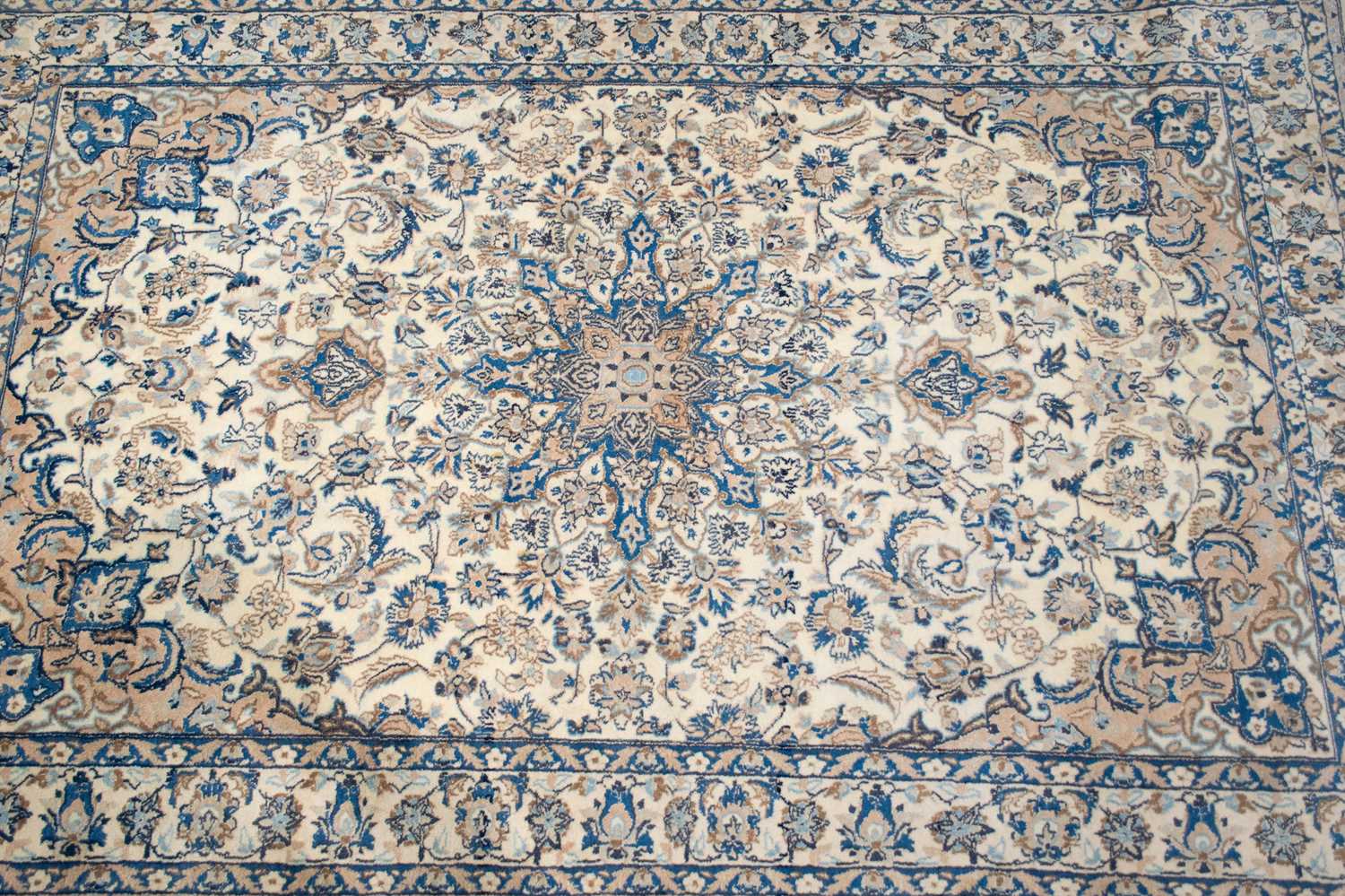 An ivory ground Nain rug with formal bookcover design, within palmette borders. 191 cm x 121 cm A pr - Image 2 of 4