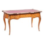 A 20th century Louis XV style cartouche topped bureau plat with tooled leather insert, gilt metal mo