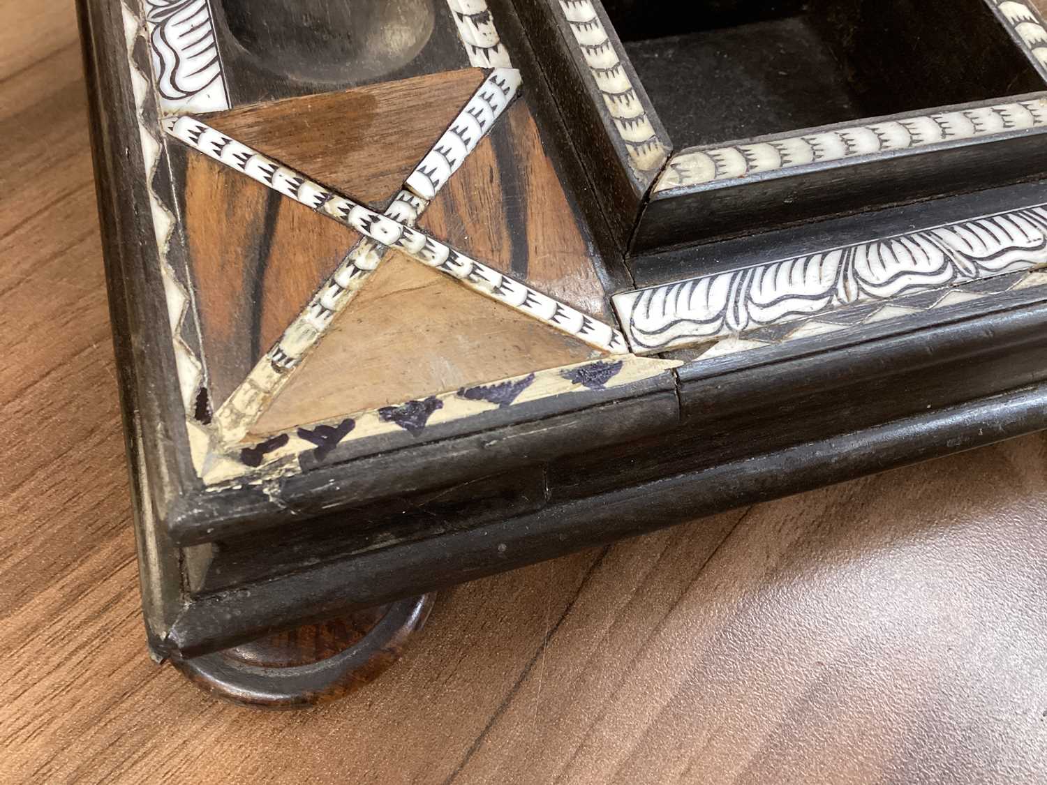 A Ceylonese ebony desk stand with calamander, coconut palm, and rosewood parquetry within pen-worked - Image 8 of 17