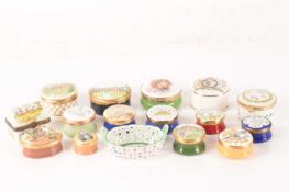 A collection of enamel trinket boxes from a variety of makers including Limoges, Halycon Days, Crumm