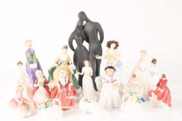 A large collection of Royal Doulton 'Pretty Ladies' comprising Lovers, Elegance, Emily, Valerie, Lav