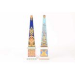 Two porcelain obelisks by Rosenthal for Versace titled Le Roi Soleil and Les Trésors de la Mer, heig